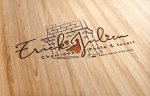 Logotype LEVELS en gravure sur une planche de bois clair